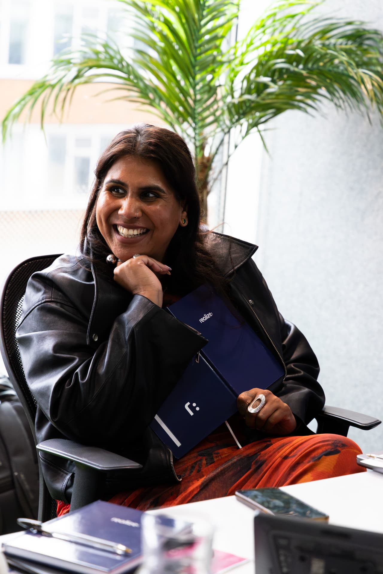 Judge holding a branded folder