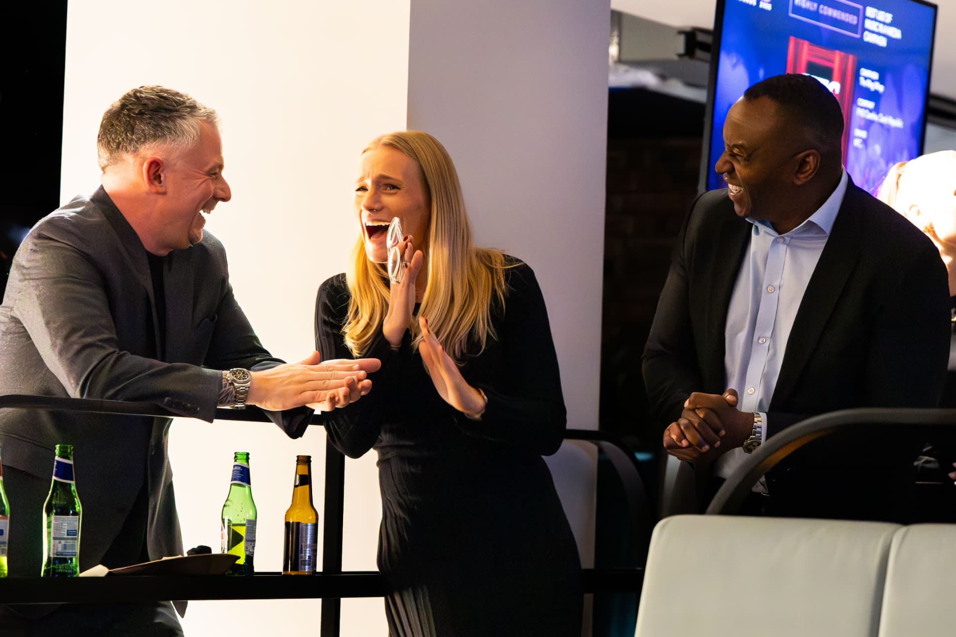Winner celebrating with guests after the award