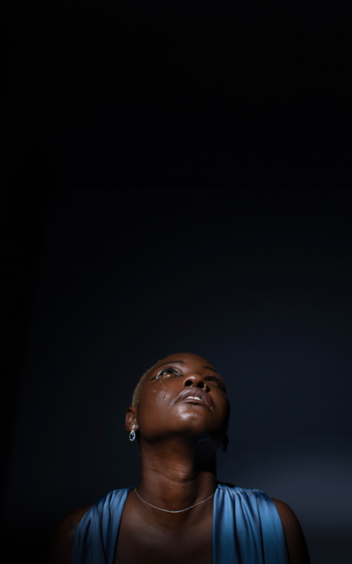 Low-angle portrait of a model looking upward