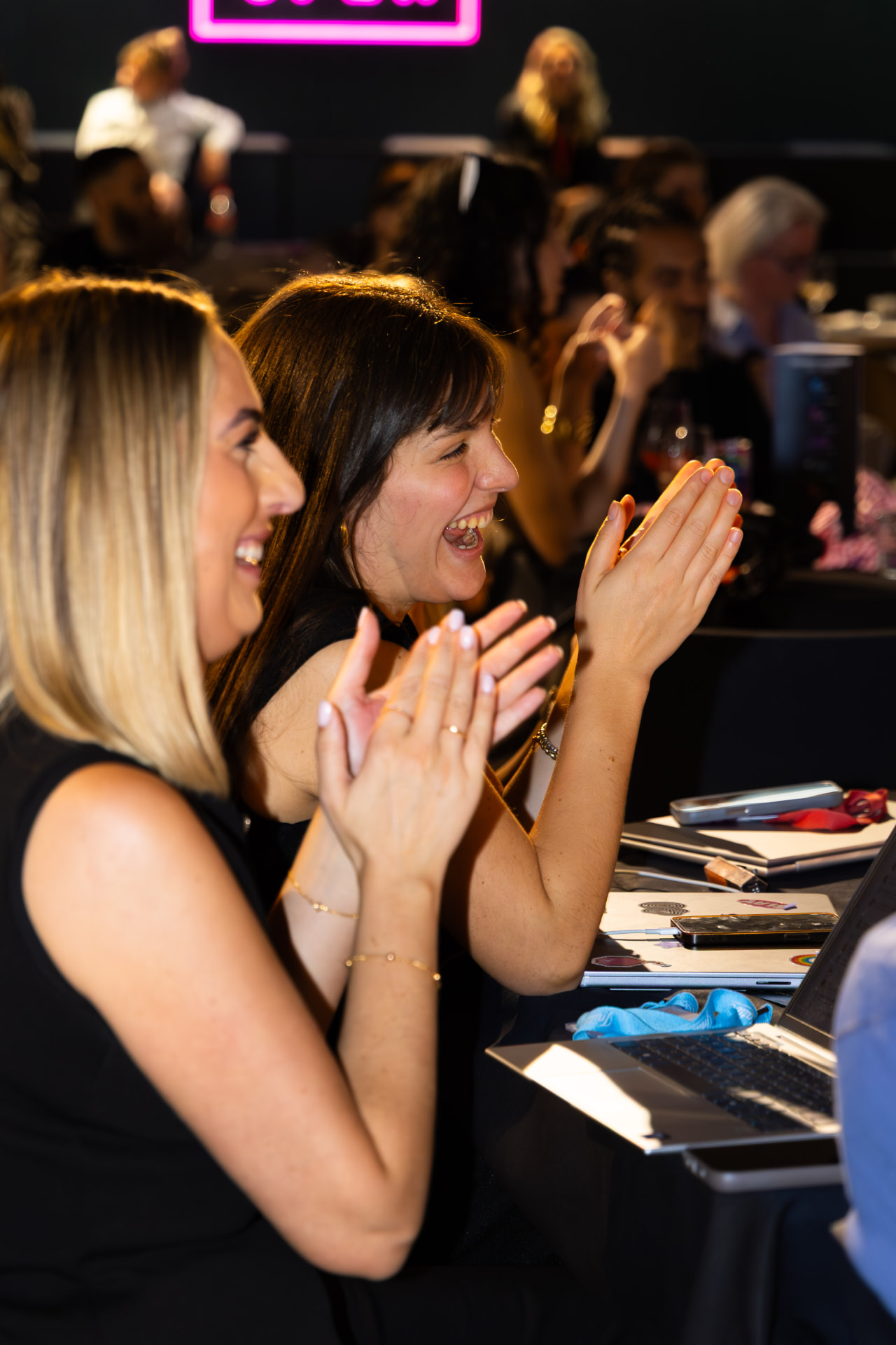 Guests applauding a winner announcement