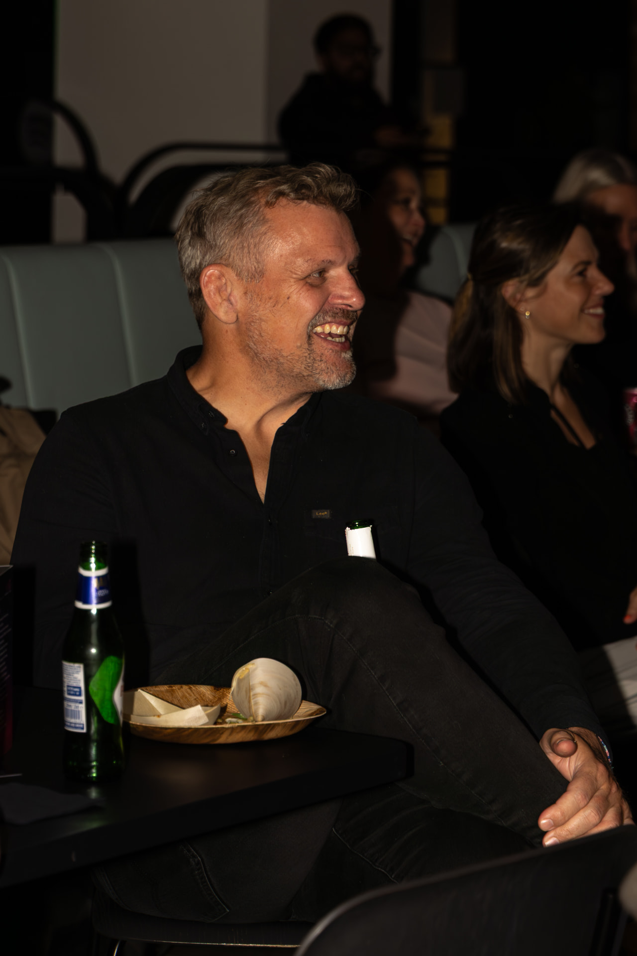 Audience member laughing during the talks